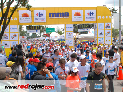 Digenes and Elsa run the Bogot Half Marathon - July 31, 2011