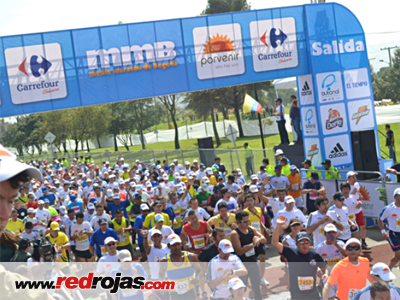 Digenes and Elsa run the Bogot Half Marathon - July 31, 2011