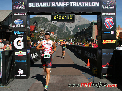 Cameron crosses the finish line at the Subaru Olympic Tri - Banff, Canada - September 8, 2012