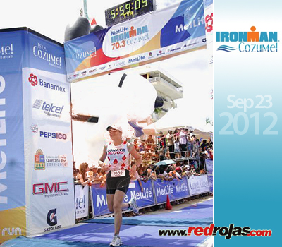 Andrea crossing the Finish line at the Cozumel 70.3 Triathlon - Cozumel, Mexico - September 23, 2012