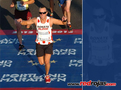 Adrian crossing the finish line - Portland Marathon - October 7, 2012
