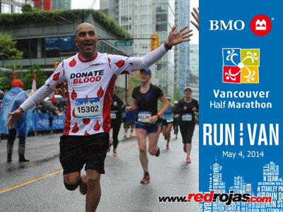 High 5's for Jorge at the 2014 BMO Vancouver Half Marathon - Vancouver, BC - May 4, 2014