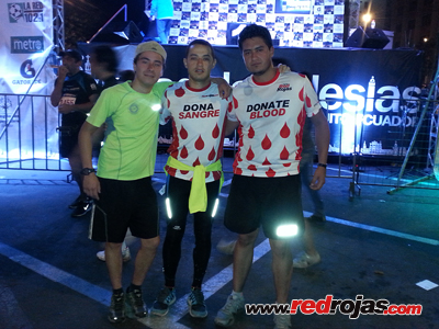 Sebastin and Saulo at the 'Ruta de Las Iglesias 10k', night run - Quito, Ecuador